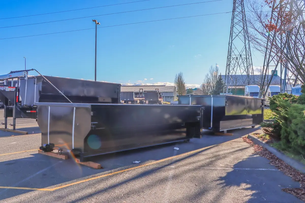 Roll-off dumpster ready for waste disposal at job site for 2 Yard Dumpster Rental in Delafield